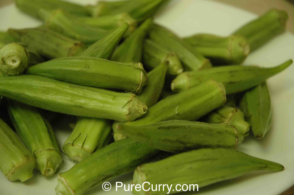 Raw Okra On Cutting Board