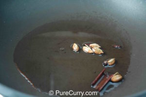 Shahi Paneer - Toasting spices in oil