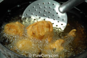 Batata Vada, frying