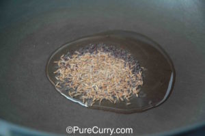 Cumin Seeds and Mustard Seeds in Oil